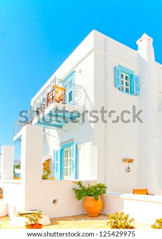 Beautiful complex of traditional old houses with blue colored doors and  windows in Chora the capital of Amorgos island in Greece