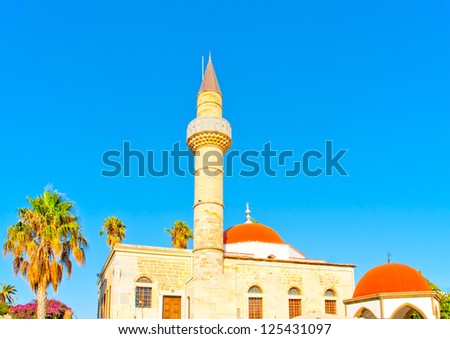 Old islamic church building with mosque and minaret tower in Kos island in Greece
