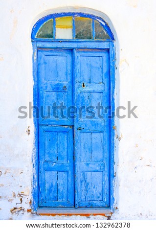 Beautiful blue colored wooden door of a house in Langada a village of Amorgos island in Greece