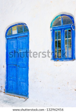 Beautiful blue colored wooden door of a house in Langada a village of Amorgos island in Greece