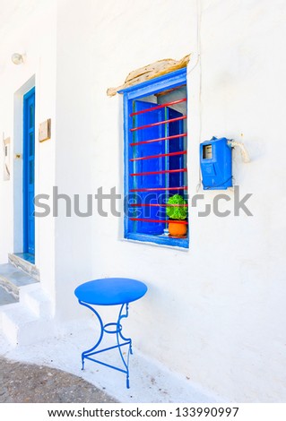 Beautiful blue colored wooden window in a house in Langada a village of Amorgos island in Greece