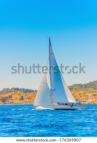 A really beautiful big old classic wooden racing sailing boat during a Classic Boats Regatta in Spetses island in Greece