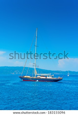 big beautiful sailing yacht in the port of Hydra island in Greece