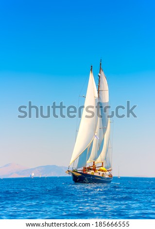 A really big 3 mast old classic wooden sailing boat during a Classic Boats Regatta in Spetses island in Greece