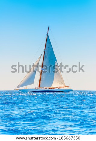 A really beautiful big old classic wooden racing sailing boat during a Classic Boats Regatta in Spetses island in Greece