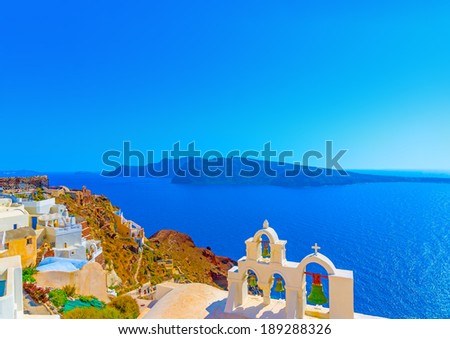 Amazing view to the sea including a multi Belltower from an old traditional church in Oia the most beautiful village of Santorini island in Greece