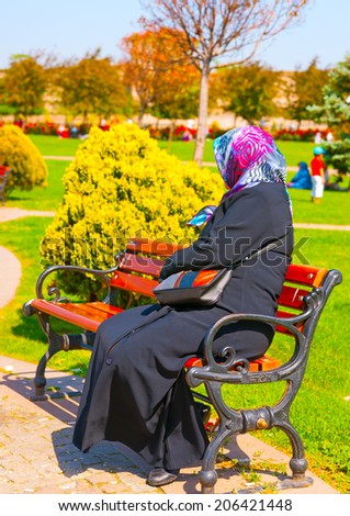 ISTANBUL, TURKEY - MAY 18 : Panorama 1453 area on May 18, 2013 in Istanbul, Turkey. A muslin woman with traditional dress resting in the park.