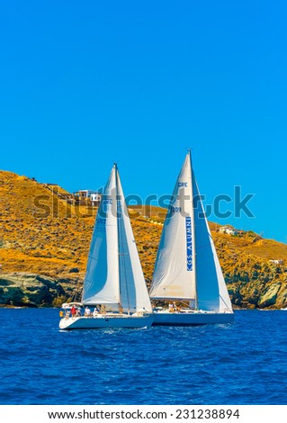 AEGEAN SEA, GREECE - JUN 2, 2013: Racing sailing boats during a regatta at Aegean sea near Kea island in Greece on Jun 2, 2013