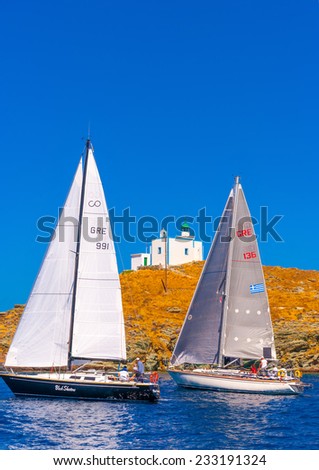 AEGEAN SEA, GREECE - JUN 2, 2013: Racing sailing boats during a regatta at Aegean sea near Kea island in Greece on Jun 2, 2013