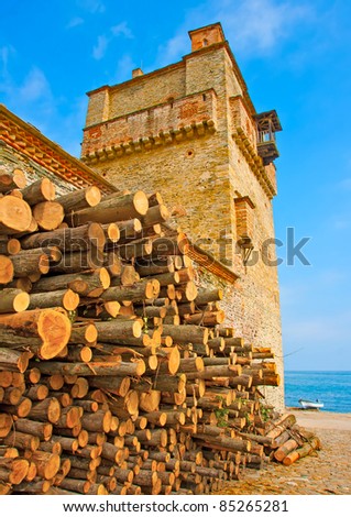 Old stone made like a tower building by the sea near monastery Iviron in holy mountain Athos in Greece