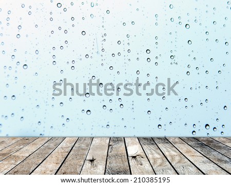 Wood floor with rainy drop on the mirror background