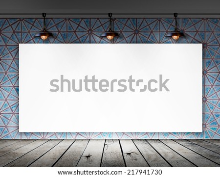 Blank frame with Ceiling lamp in tile room
