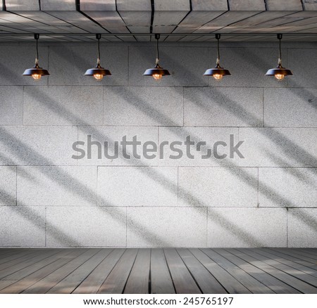 Lamp at Grungy concrete wall with wood floor, Template for product display