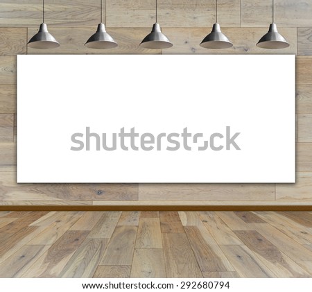 Blank frame on wood wall with Ceiling lamp for information message