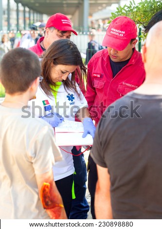 NINE, PORTUGAL - APRIL 12, 2014: Emergency doctor at a scene of a train accident simulation in Nine train station