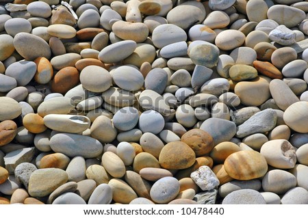 abstract background with round peeble stones at the beach