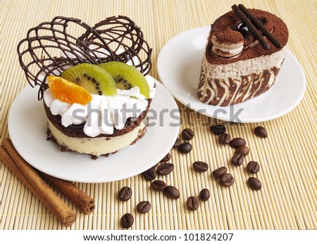 Chocolate Cake and cake with fruits on the table