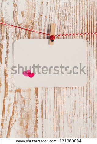 Card with  heart on wood, for your love message