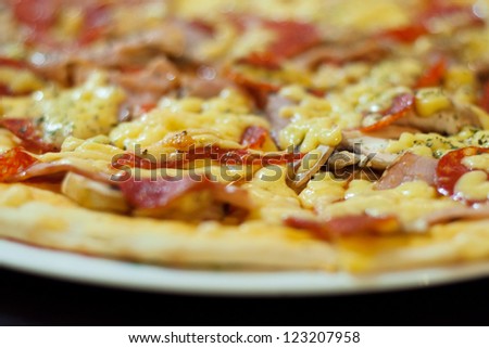 Close up of freshly baked gourmet thin crust pizza