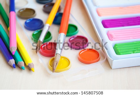 art and craft equipment on a school table
