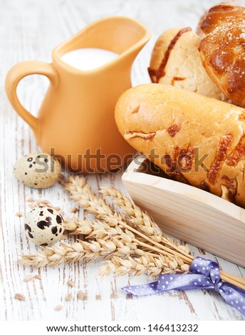 still life with bread, milk and eggs