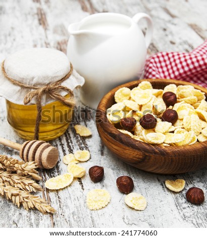 flakes with honey, fruits, nuts and milk - healthy breakfasts