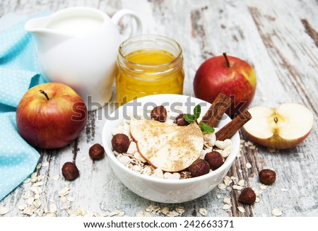 flakes with honey, fruits, nuts and milk - healthy breakfast