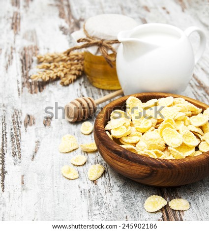 flakes with honey, nuts and milk - healthy breakfast