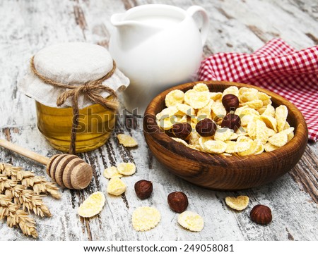 flakes with honey, fruits, nuts and milk - healthy breakfasts