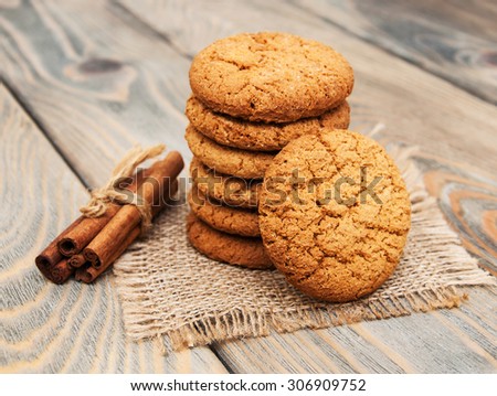 Oatmeal cookies on a old wooden background