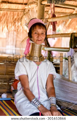 Chiang Mai, Thailand - NOVEMBER 23, 2014: Long neck lady. Kayan Lahwi tribe known for wearing neck rings, brass coils to extend the neck. Kayan, Red Karen (Karenni).