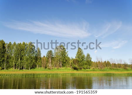 Chusovaya river  in rising sun beams. Summer in Russia
