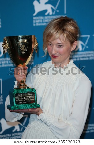 VENICE, ITALY - SEPTEMBER 06: Alba Rohrwacher with her Best Actress award during the award winners photocall during the 71st Venice Film Festival on September 06, 2014 in Venice, Italy