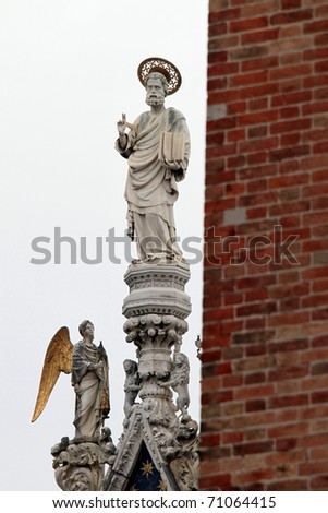 The San Marco statue over the San Marco church, Venice, Italy