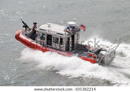 NEW YORK CITY, USA - JUNE 10: U.S. Coast Guard patrol boat on Upper New York Bay. June 10, 2012 in New York City, USA