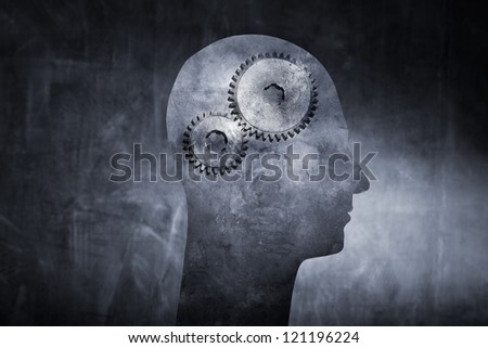 Conceptual image of a head with cog gears as brain.