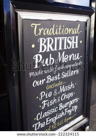 LONDON, UK - APRIL 16, 2014: Traditional British Pub Menu. Advertising in front of a pub.