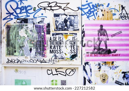 LONDON, UK - APRIL 18, 2014: Graffiti, posters and stickers on Brick Lane, Banglatown,  Spitalfields / Whitechapel.