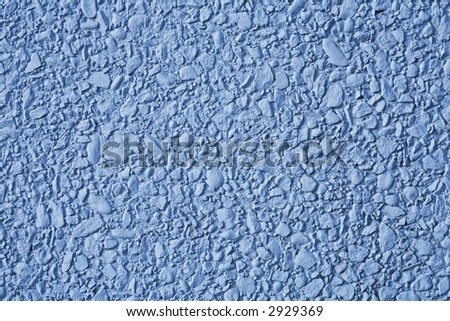 Blue background made of tiny blue rocks