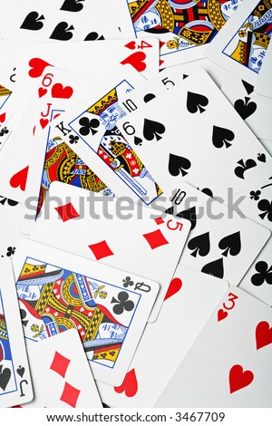 new, un-used playing cards in a random arrangement