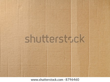 Corrugated cardboard background with some wrinkles