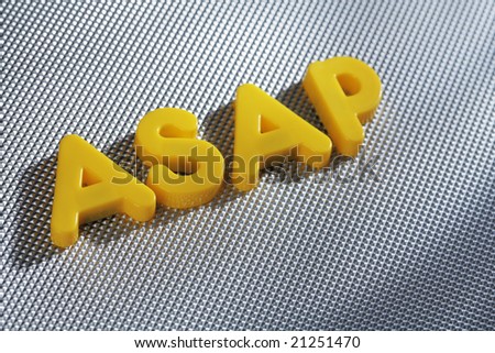 Word ASAP (acronym for As Soon As Possible) written with yellow plastic letters