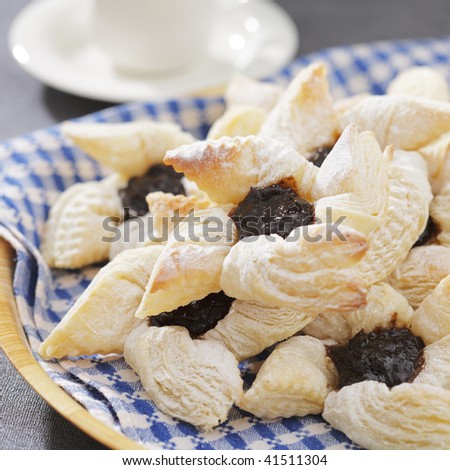 Finnish christmas time Joulutorttu puff pastries with dried plum marmalade.