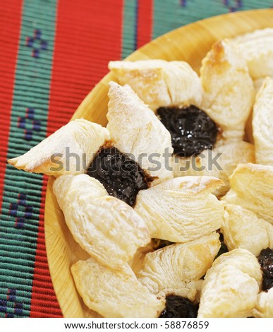 Finnish star shaped christmastime puff pastries with dried plum marmalade, \
