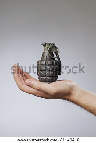 Holding Grenade