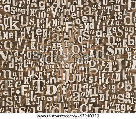 Grunge and gritty background texture made of old printed letters.