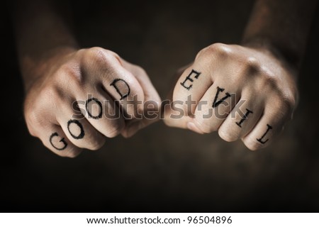 stock photo Man with Good and Evil fake tattoos