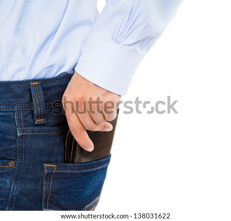 Man pulls the wallet from his jeans pocket, close-up