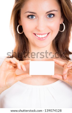 Beautiful woman showing business card isolated on white background