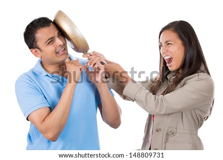 Closeup portrait of angry young woman hitting surprised shocked funny man  on face with frying pan, isolated on white background. Negative emotion  facial expression feelings, reaction, situation. - Stock Image - Everypixel